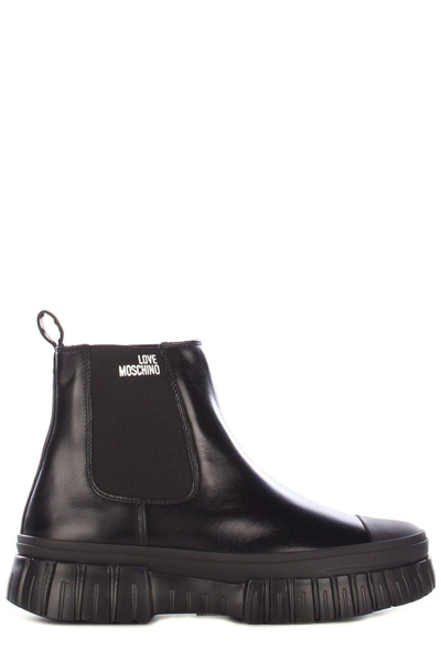 Shop Love Moschino Logo Printed Chunky Boots In Nero
