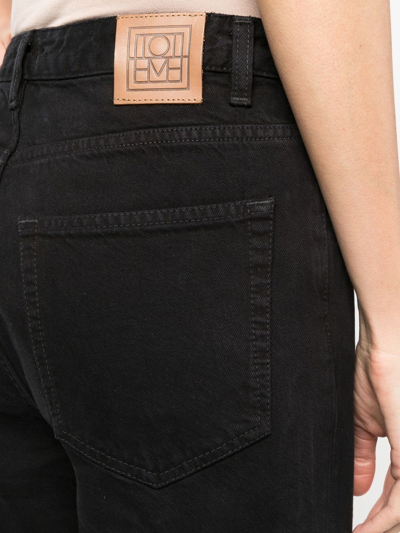 Totême High-waisted Flared Jeans In Black