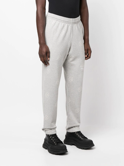 Shop Martine Rose All-over Logo-print Track Pants In Grey