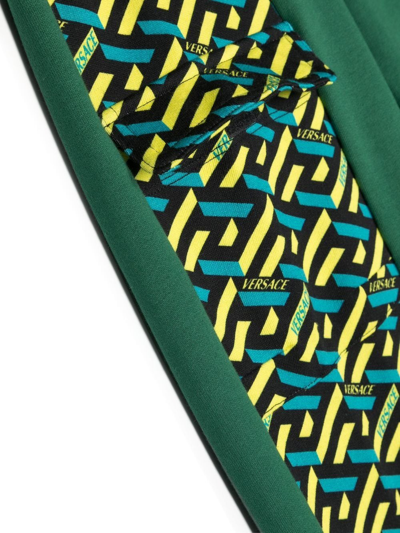 Shop Versace Geometric-pattern Print Track Pants In Green
