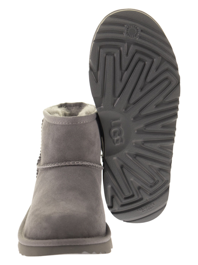 Shop Ugg Classic Mini Ii - Ankle Boot In Grey