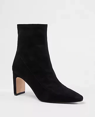 Shop Ann Taylor Blade Heel Stretch Faux Suede Booties In Black