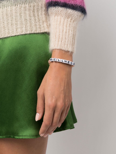 Shop Sporty And Rich Slogan-detail Beaded Bracelet In Rosa