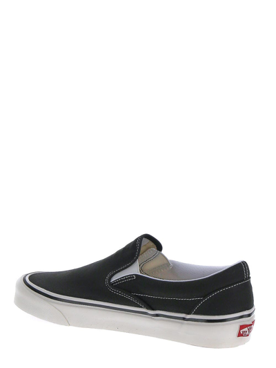 Shop Vans Classic Slip-on 9 Sneakers In Black