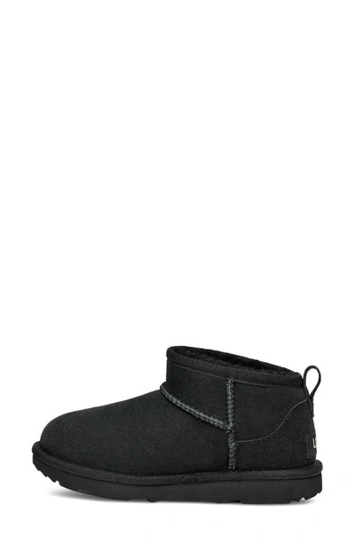 Shop Ugg Kids' Classic Ultra Water Resistant Genuine Shearling Mini Boot In Black