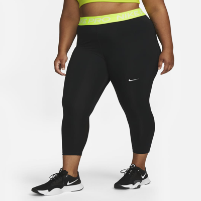 Shop Nike Women's  Pro Mid-rise Crop Leggings (plus Size) In Black