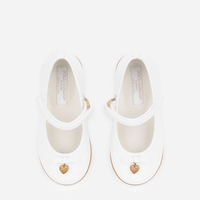 Shop Dolce & Gabbana Patent Leather Ballet Flats In White