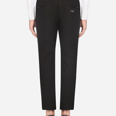 Shop Dolce & Gabbana Stretch Cotton Jogging Pants With Plate In Black