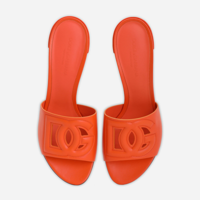 Shop Dolce & Gabbana Calfskin Mules With Dg Millennials Logo In Orange