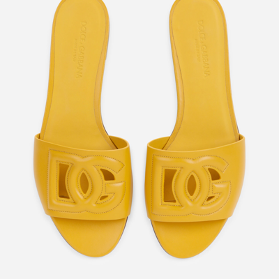 Shop Dolce & Gabbana Calfskin Sliders With Dg Logo In Yellow