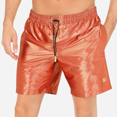 Shop Dolce & Gabbana Mid-length Swim Trunks With Metal Dg Logo In Orange