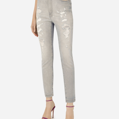 Shop Dolce & Gabbana Light Blue Denim Grace Jeans With Ripped Details In Multicolor