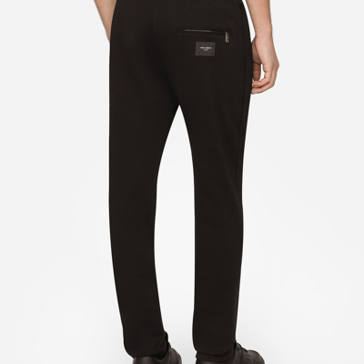 Shop Dolce & Gabbana Jersey Jogging Pants With Branded Tag In Black