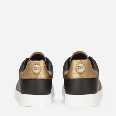 Shop Dolce & Gabbana Calfskin Nappa Portofino Sneakers With Lettering In Black/gold