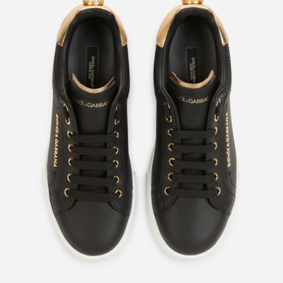Shop Dolce & Gabbana Calfskin Nappa Portofino Sneakers With Lettering In Black/gold