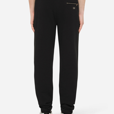 Dolce & Gabbana Rear Logo Patched Track Pants In Black