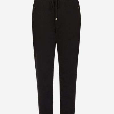 Dolce & Gabbana Rear Logo Patched Track Pants In Black