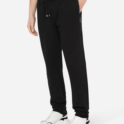 Dolce & Gabbana Rear Logo Patched Track Pants In Black