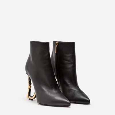 Shop Dolce & Gabbana Nappa Leather Ankle Boots With Baroque Dg Detail In Black