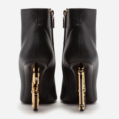 Shop Dolce & Gabbana Nappa Leather Ankle Boots With Baroque Dg Detail In Black