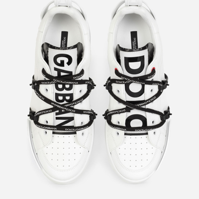 Shop Dolce & Gabbana Portofino Sneakers In Calfskin And Patent Leather In White/black