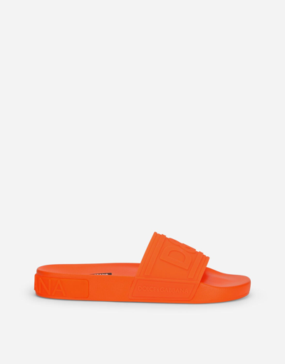 Shop Dolce & Gabbana Fluorescent Rubber Beachwear Sliders With D&g Logo In Orange