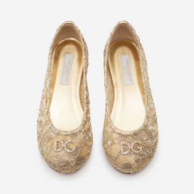 Shop Dolce & Gabbana Laminated Lace Ballerina Shoes With Dg Rhinestones In Gold