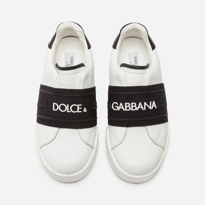 Shop Dolce & Gabbana Portofino Light Sneakers With Elastic Rubber Logo In White/black