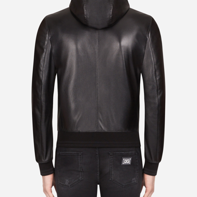 Shop Dolce & Gabbana Leather Jacket With Hood And Branded Tag In Black