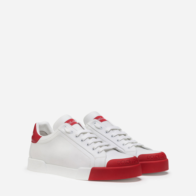 Shop Dolce & Gabbana Calfskin Nappa Portofino Sneakers With Rubber Toe In White/red