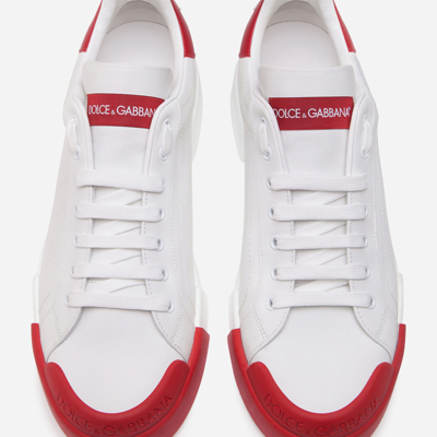 Shop Dolce & Gabbana Calfskin Nappa Portofino Sneakers With Rubber Toe In White/red