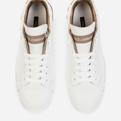 Dolce & Gabbana Portofino White And Gold Low Top Sneakers With Logo In Leather Woman In Gold