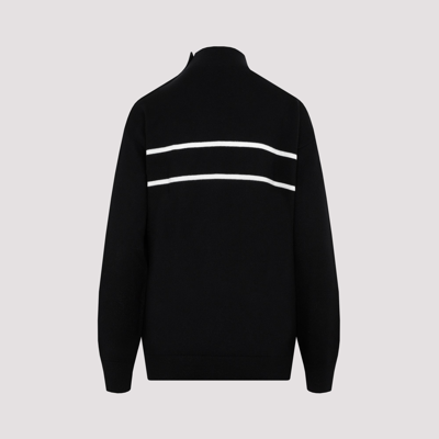 Shop Moncler Wool Logo Turtleneck Sweater In Black