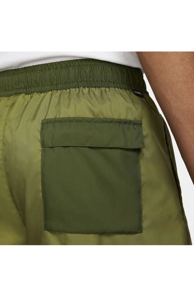 Shop Nike Essentials Colorblock Flow Shorts In Rough Green/ Pilgrim