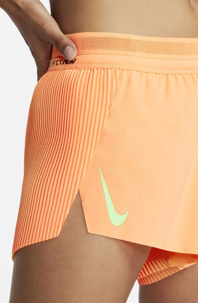 Nike Aeroswift Pleated Neon Stretch-shell Shorts In Orange | ModeSens
