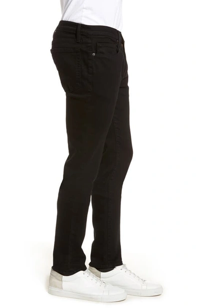 Shop Frame L'homme Skinny Fit Jeans In Noir