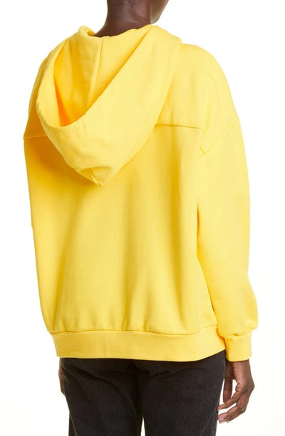 Shop Alexander Mcqueen Graffiti Logo Cotton Hoodie In Pop Yellow / Black