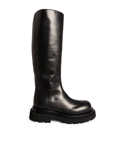 Shop Bottega Veneta Leather Lug Knee-high Flatform Boots 55 In Black