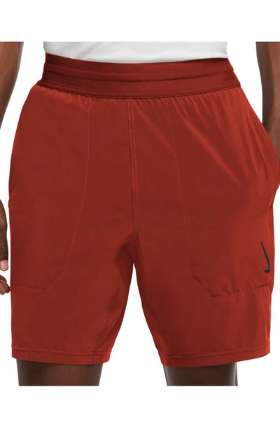Shop Nike Dri-fit Flex Pocket Yoga Shorts In Cinnabar/ Blk