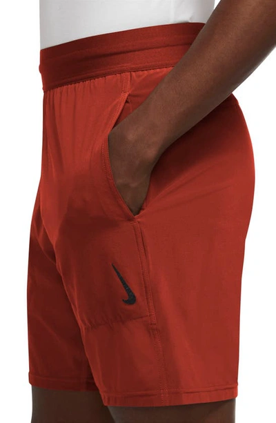 Shop Nike Dri-fit Flex Pocket Yoga Shorts In Cinnabar/ Blk