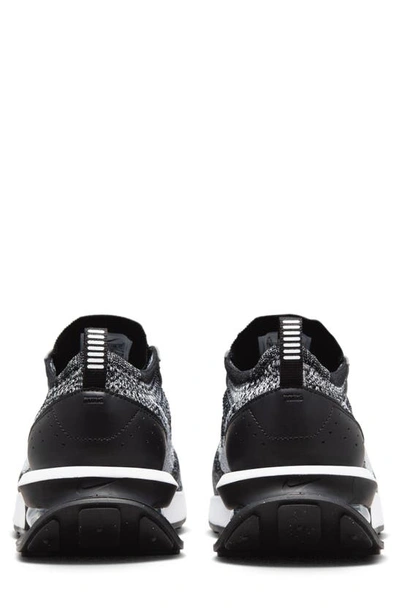 Shop Nike Air Max Flyknit Racer Sneaker In Black/ White