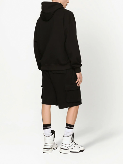 Shop Dolce & Gabbana Embossed-logo Cotton-blend Hoodie In Black