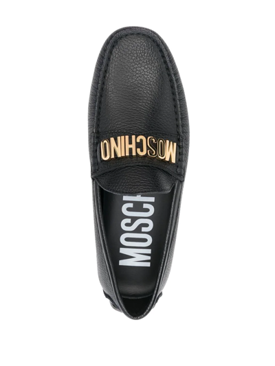 Shop Moschino Logo-plaque Detail Loafers In Schwarz