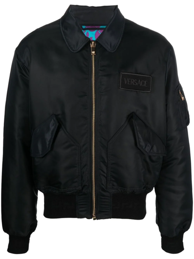 Shop Versace Logo-patch Bomber Jacket In Schwarz
