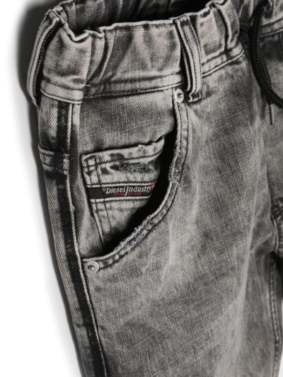 KROOLEY DISTRESSED-EFFECT JEANS