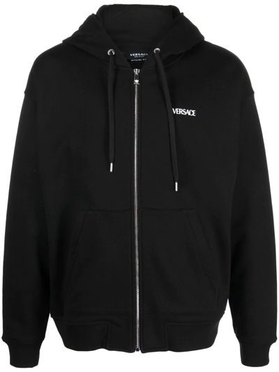 Shop Versace Logo-print Zip-fastening Hoodie In Schwarz