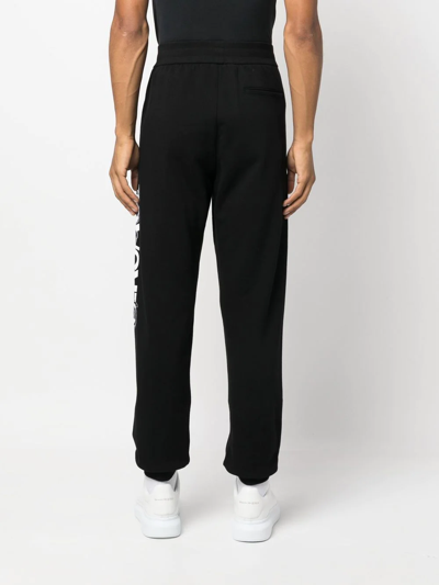 Versace Logo-print Slim-cut Track Pants In Schwarz