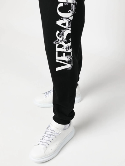 Versace Logo-print Slim-cut Track Pants In Schwarz