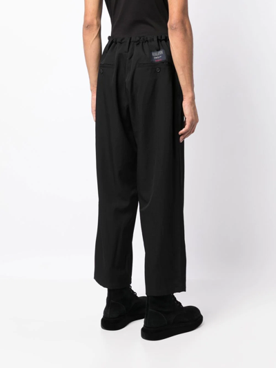 Shop Yohji Yamamoto Straight-leg Wool Trousers In Schwarz