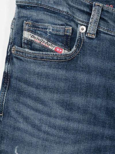 Shop Diesel Straight Jeans With A Worn Effect In Blue